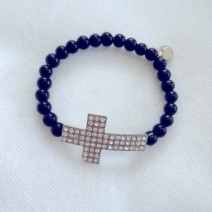 Black beaded stretch bracelet with rhinestone cross